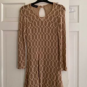 Crochet Look beige dress with a slight swing.